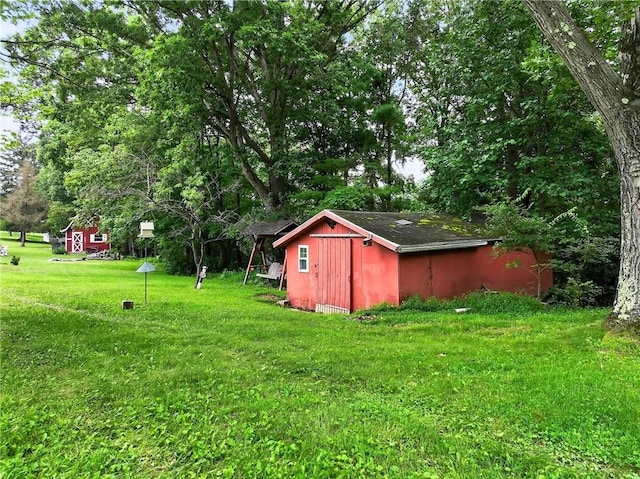 215 Diane Dr, Carroll Twp, PA 15063 - view of green lawn with a storage unit