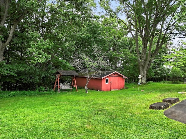 215 Diane Dr, Carroll Twp, PA 15063 - view of grassy yard featuring a storage unit