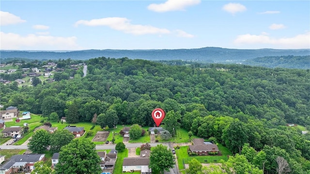 215 Diane Dr, Carroll Twp, PA 15063 - aerial view of residential area featuring a heavily wooded area and a mountain backdrop