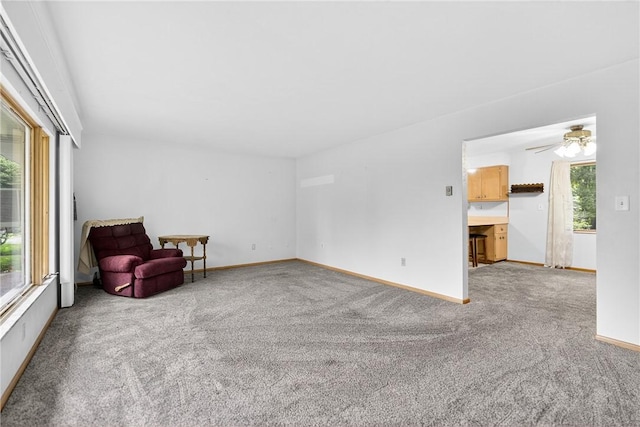 215 Diane Dr, Carroll Twp, PA 15063 - unfurnished room with light carpet and a ceiling fan