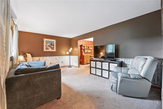 103 Sanger Rd, North Sewickley Twp, PA 15010 - carpeted living area featuring a wainscoted wall