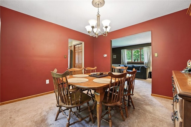 103 Sanger Rd, North Sewickley Twp, PA 15010 - dining space with light carpet and a chandelier