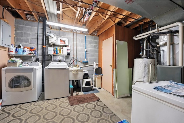 103 Sanger Rd, North Sewickley Twp, PA 15010 - laundry area with independent washer and dryer, gas water heater, electric panel, and concrete block wall