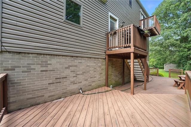 103 Sanger Rd, North Sewickley Twp, PA 15010 - wooden terrace featuring stairs, a storage unit, and a patio