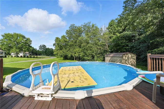 103 Sanger Rd, North Sewickley Twp, PA 15010 - swimming pool featuring a yard, a wooden deck, a shed, and view of wooded area