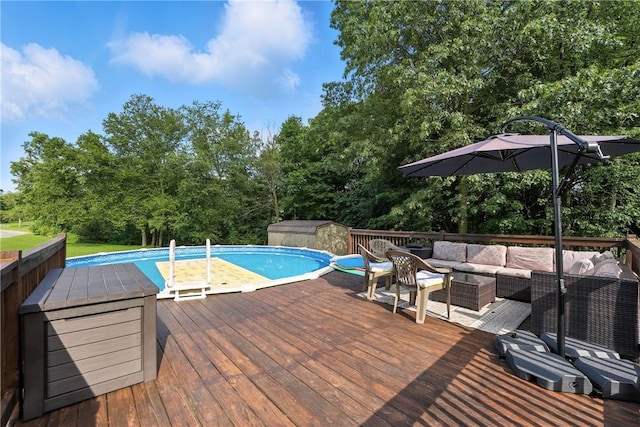 103 Sanger Rd, North Sewickley Twp, PA 15010 - outdoor pool with an outdoor hangout area, a deck, a storage unit, and view of scattered trees