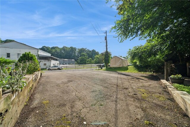 15 Old Saxonburg Blvd, West Deer, PA 15084 - view of asphalt driveway featuring street lights