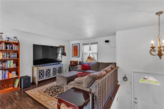 2128 Stoops Ct, Apollo Boro, PA 15673 - living room featuring a chandelier and wood finished floors