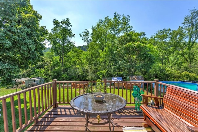 2128 Stoops Ct, Apollo Boro, PA 15673 - deck with a yard, view of scattered trees, and an outdoor pool