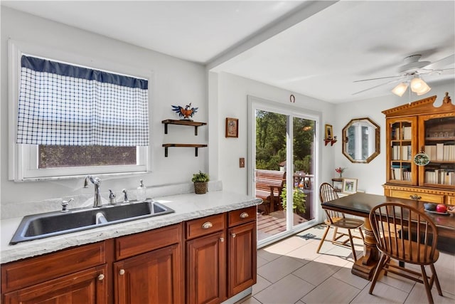 2128 Stoops Ct, Apollo Boro, PA 15673 - kitchen with ceiling fan and light tile patterned flooring