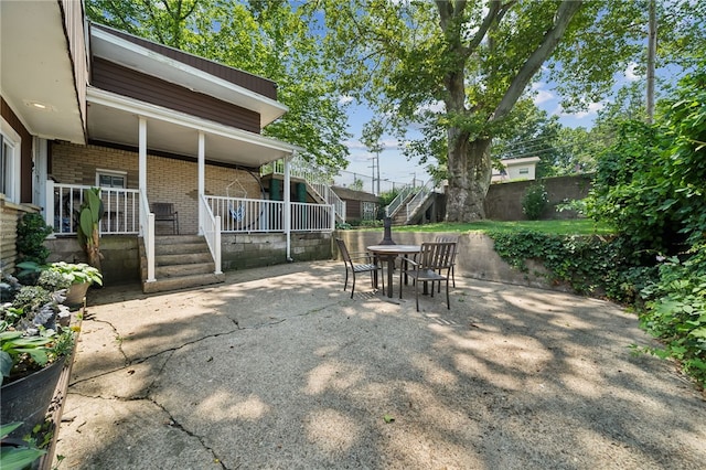 4075 Greensburg Pike, Wilkins Twp, PA 15221 - porch featuring outdoor dining area and a patio area