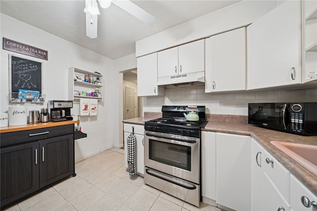 4075 Greensburg Pike, Wilkins Twp, PA 15221 - kitchen with stainless steel stove, black microwave, under cabinet range hood, and open shelves