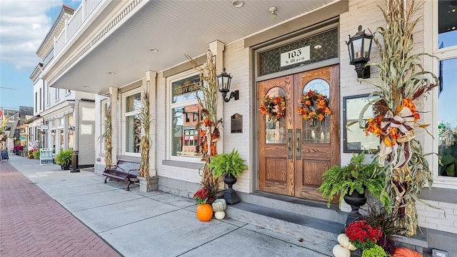 211 Truth Cir, Jackson Twp, PA 16037 - property entrance with covered porch and french doors