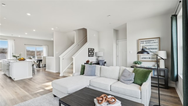 211 Truth Cir, Jackson Twp, PA 16037 - living room with light wood finished floors, stairway, and recessed lighting