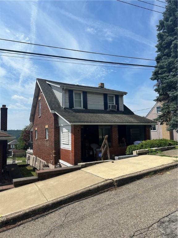 1634 Beech Ave, Turtle Creek, PA 15145 - view of front of property featuring brick siding and a chimney