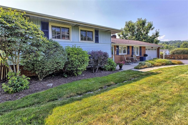 2 Redgrave Dr, Hempfield Twp, PA 15601 - split level home with an attached garage and board and batten siding
