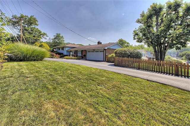 2 Redgrave Dr, Hempfield Twp, PA 15601 - split level home featuring asphalt driveway and a garage