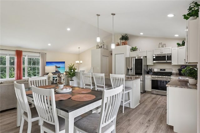 196 Weathervane Dr, Slippery Rock Twp, PA 16057 - dining area featuring vaulted ceiling, light wood finished floors, a chandelier, and recessed lighting