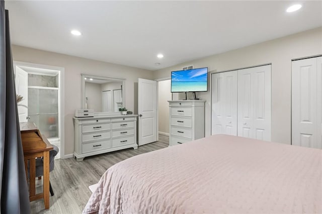 196 Weathervane Dr, Slippery Rock Twp, PA 16057 - bedroom with light wood-style flooring, multiple closets, recessed lighting, and connected bathroom