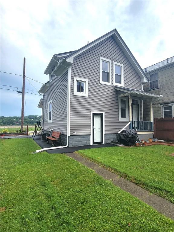413 River Ave, Aliquippa, PA 15001 - rear view of house with a lawn