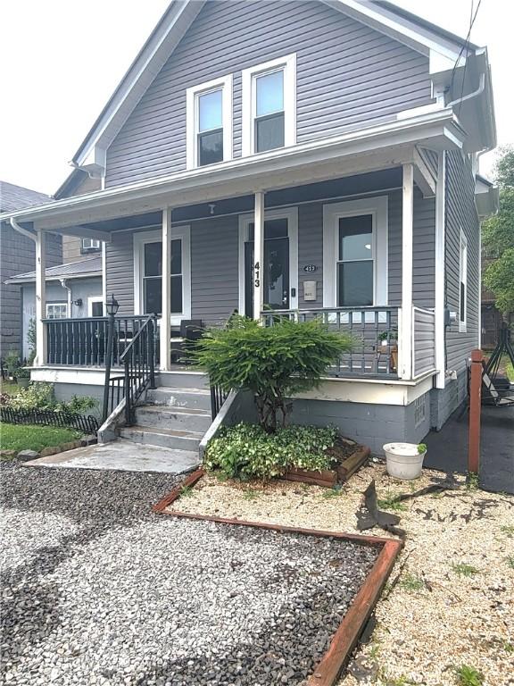 413 River Ave, Aliquippa, PA 15001 - bungalow-style home with a porch