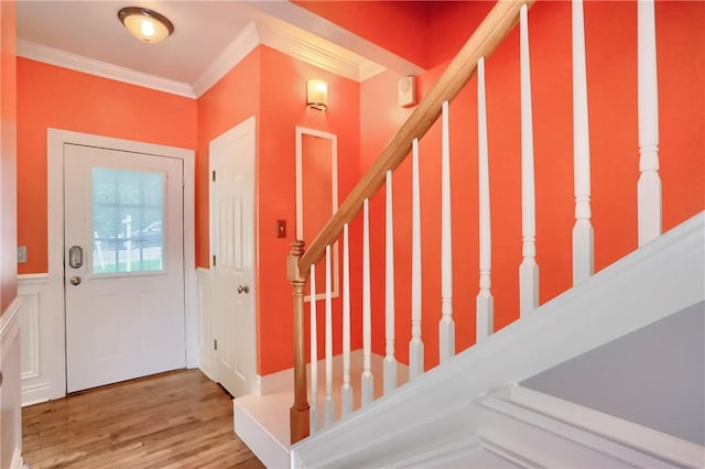 184 Wynne St, Shaler, PA 15209 - entrance foyer with ornamental molding, stairs, and wood finished floors
