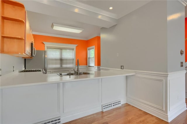 184 Wynne St, Shaler, PA 15209 - kitchen with a peninsula, a wainscoted wall, stainless steel microwave, open shelves, and ornamental molding