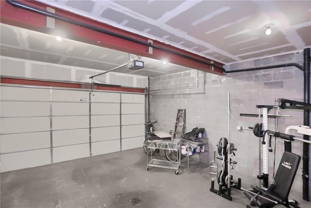 184 Wynne St, Shaler, PA 15209 - garage with a garage door opener and concrete block wall