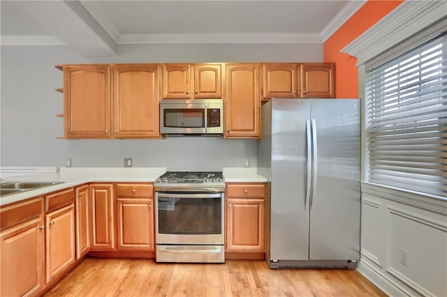 184 Wynne St, Shaler, PA 15209 - kitchen with appliances with stainless steel finishes, crown molding, open shelves, light countertops, and light wood-style flooring