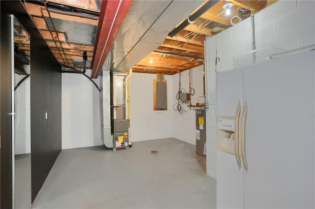184 Wynne St, Shaler, PA 15209 - unfinished below grade area with white fridge with ice dispenser, electric panel, heating unit, and water heater
