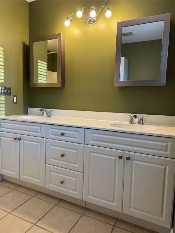 184 Wynne St, Shaler, PA 15209 - bathroom featuring double vanity and tile patterned flooring