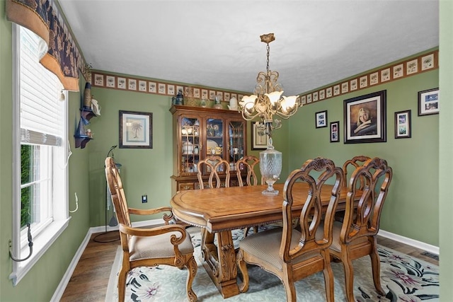 53 Peters Rd, Hempfield Twp, PA 15601 - dining space featuring a chandelier and wood finished floors