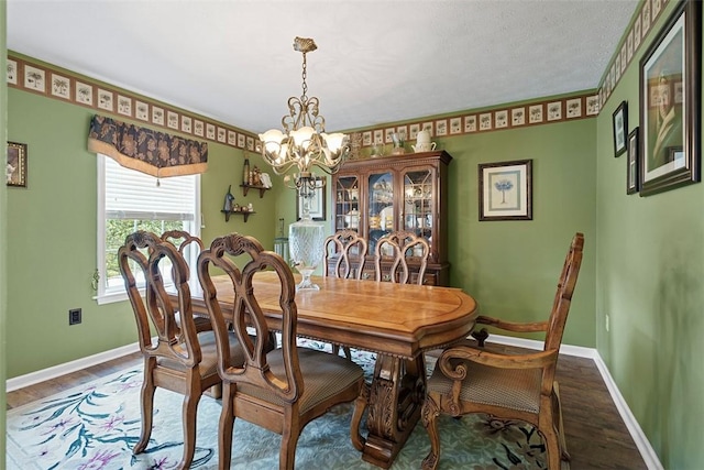 53 Peters Rd, Hempfield Twp, PA 15601 - dining area featuring a chandelier and wood finished floors