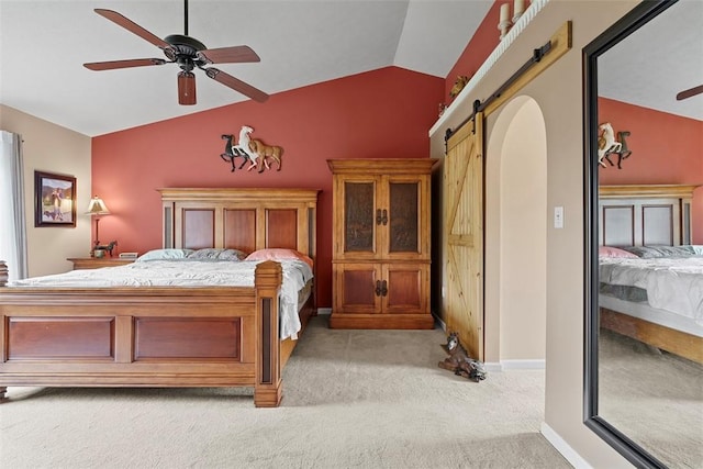 53 Peters Rd, Hempfield Twp, PA 15601 - bedroom featuring a barn door, vaulted ceiling, light carpet, and a ceiling fan