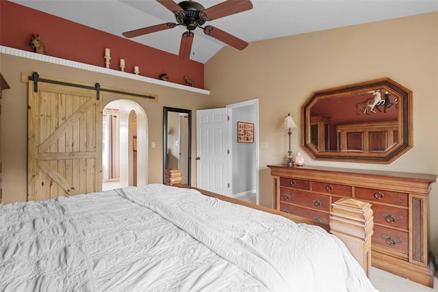 53 Peters Rd, Hempfield Twp, PA 15601 - bedroom with arched walkways, lofted ceiling, a barn door, and a ceiling fan