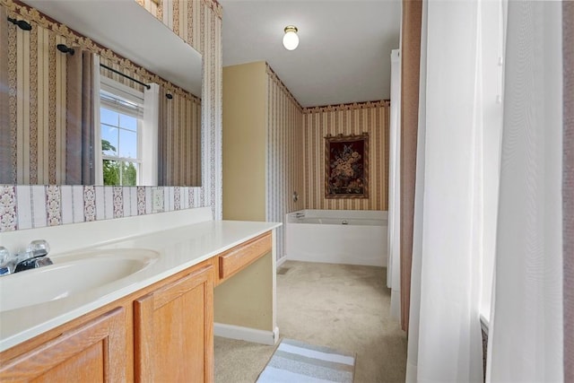 53 Peters Rd, Hempfield Twp, PA 15601 - full bathroom featuring wallpapered walls, vanity, and a bath
