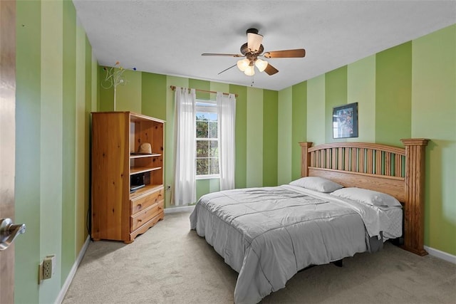 53 Peters Rd, Hempfield Twp, PA 15601 - bedroom featuring light carpet, a ceiling fan, and wallpapered walls