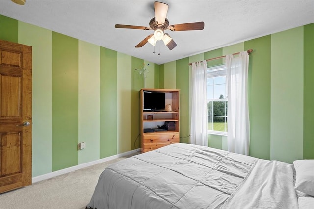 53 Peters Rd, Hempfield Twp, PA 15601 - bedroom with carpet flooring, a ceiling fan, and wallpapered walls