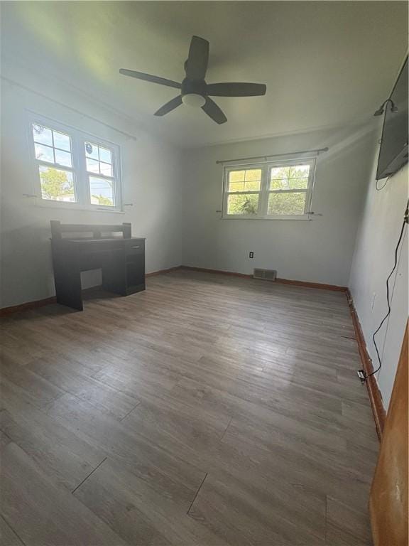 13 Kepple St, Penn Twp, PA 15644 - empty room with a ceiling fan and wood finished floors