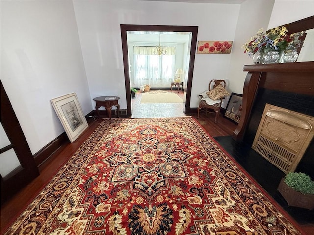 149 N 3rd St, Duquesne, PA 15110 - hallway with wood finished floors and a chandelier