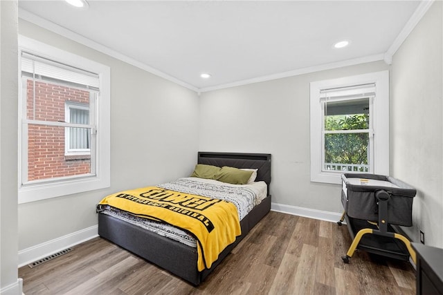 411 Center Ave, West View, PA 15229 - bedroom with wood finished floors, crown molding, and recessed lighting