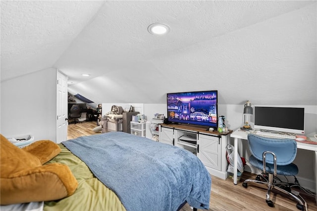 411 Center Ave, West View, PA 15229 - bedroom with lofted ceiling, a textured ceiling, a desk, and light wood finished floors