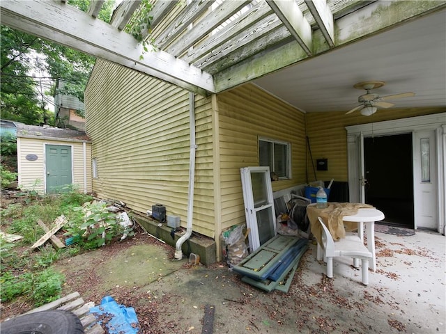 234 Simon Aly, Duquesne, PA 15110 - view of patio with ceiling fan and a shed