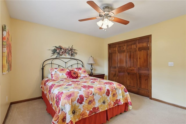 308 Heather Hill Dr, Pine Twp, PA 15044 - bedroom featuring light colored carpet, a closet, and a ceiling fan