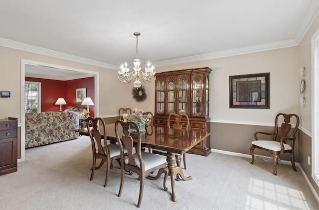308 Heather Hill Dr, Pine Twp, PA 15044 - dining space featuring light carpet, a chandelier, and ornamental molding