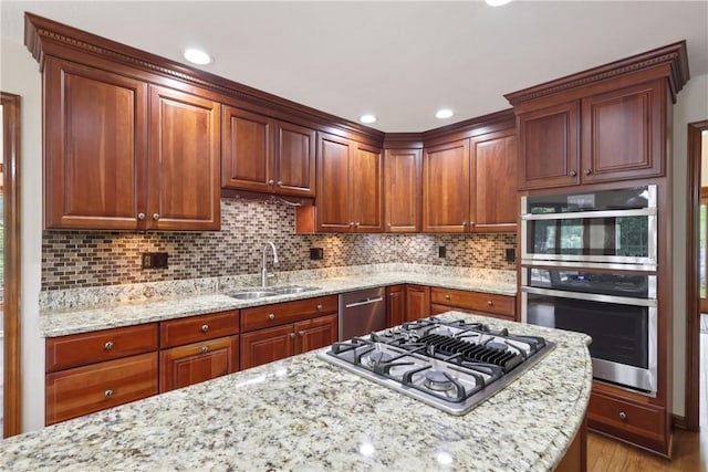 308 Heather Hill Dr, Pine Twp, PA 15044 - kitchen with appliances with stainless steel finishes, light wood-style floors, light stone counters, backsplash, and recessed lighting