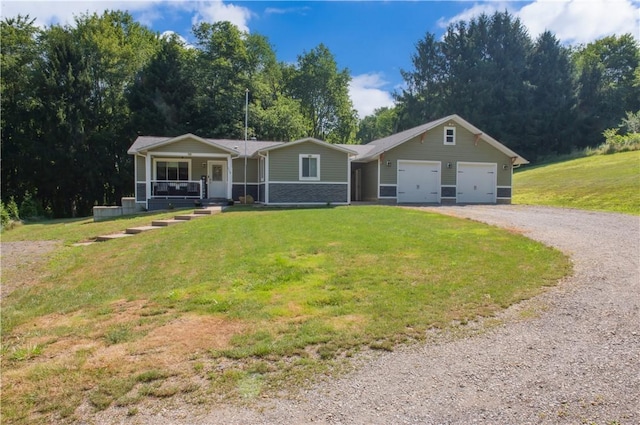 113 Betty Ln, Butler, PA 16002 - ranch-style home featuring gravel driveway, a garage, a porch, and a front yard