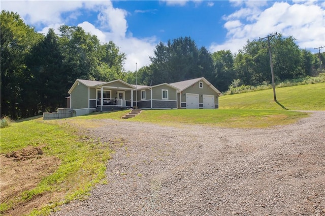 113 Betty Ln, Butler, PA 16002 - view of front of property featuring a porch, driveway, a front yard, and an attached garage