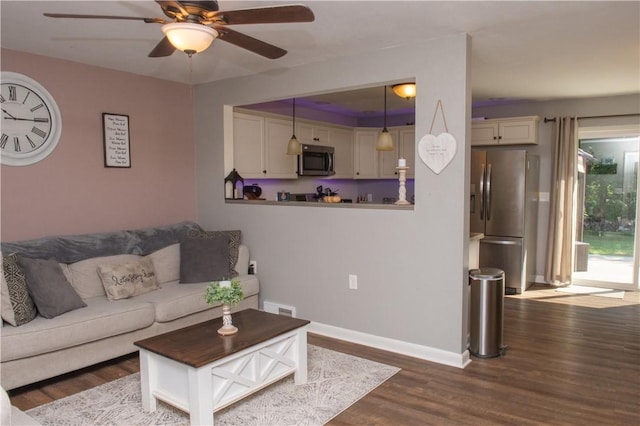 113 Betty Ln, Butler, PA 16002 - living room featuring ceiling fan and dark wood-type flooring