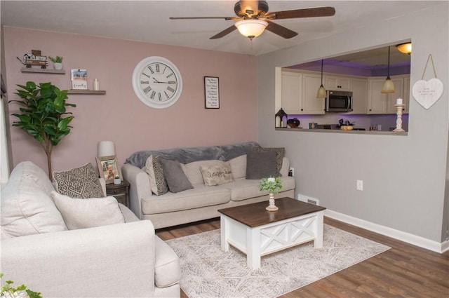 113 Betty Ln, Butler, PA 16002 - living room featuring ceiling fan and dark wood finished floors